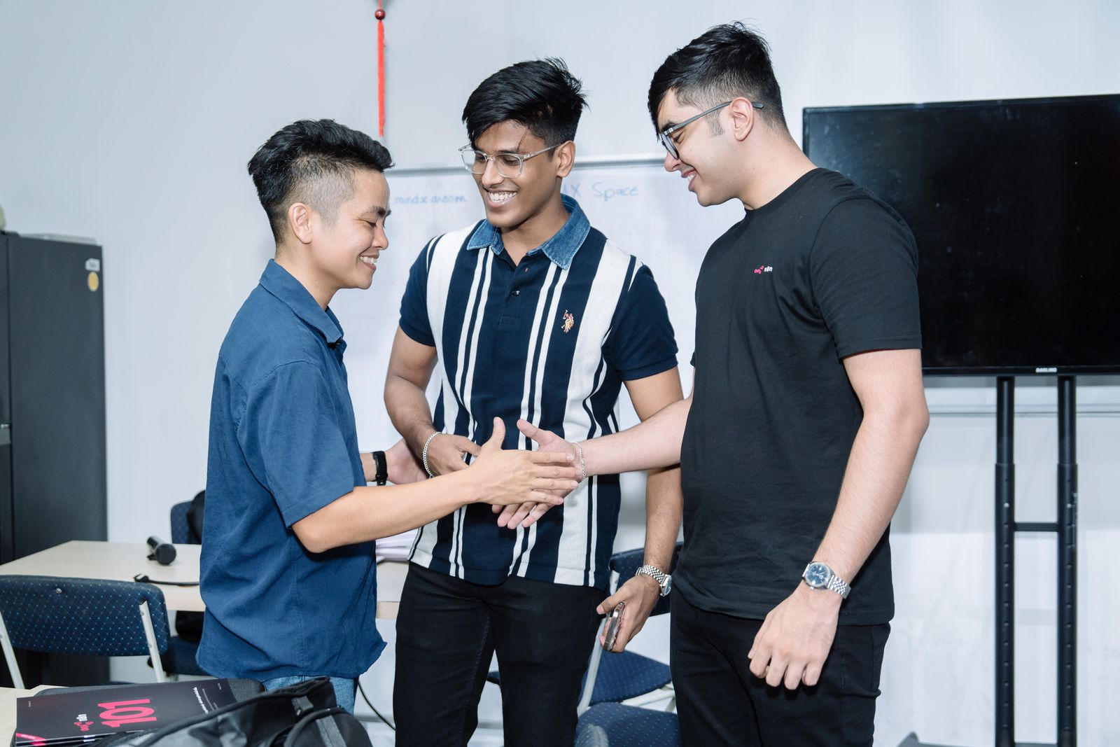 Anshul Namdev (right) with fellow builders at the n8n Builders Challenge